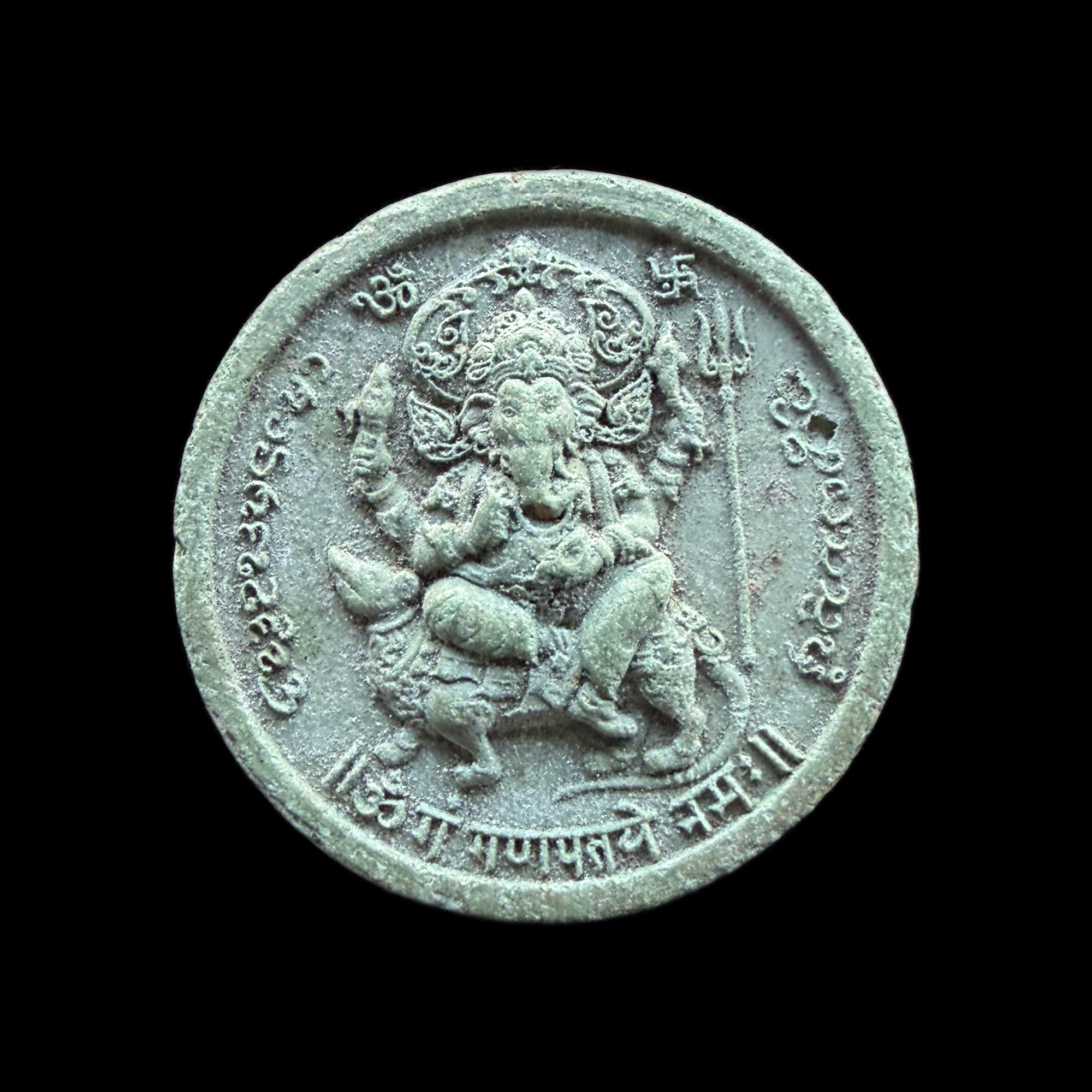 Ganesha — Green-Patina Round Multi-Armed Medallion, front view