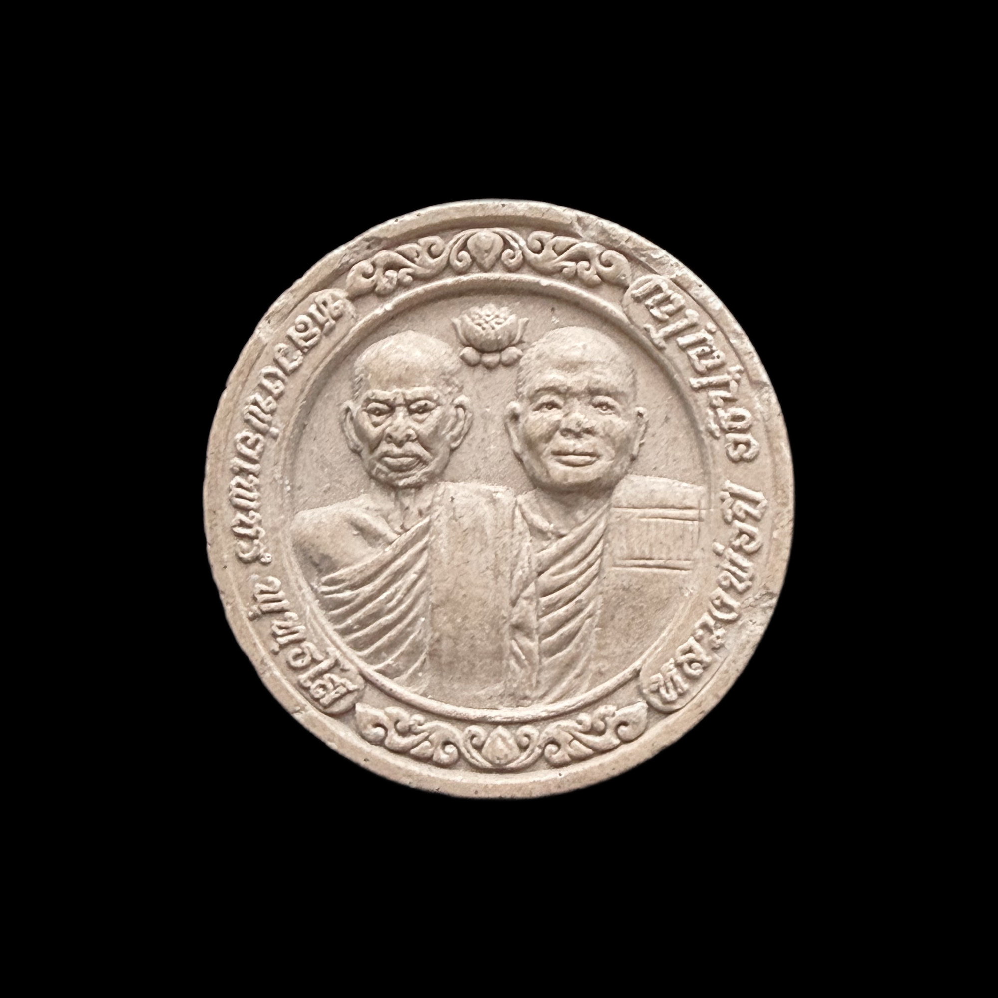 Seated Buddha — Round Twin-Monk Portrait Medallion, back view